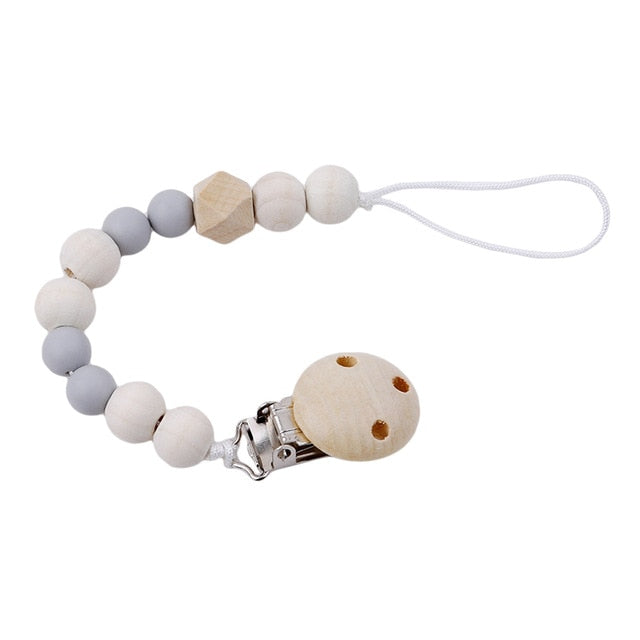 Attache tétine en perles en bois